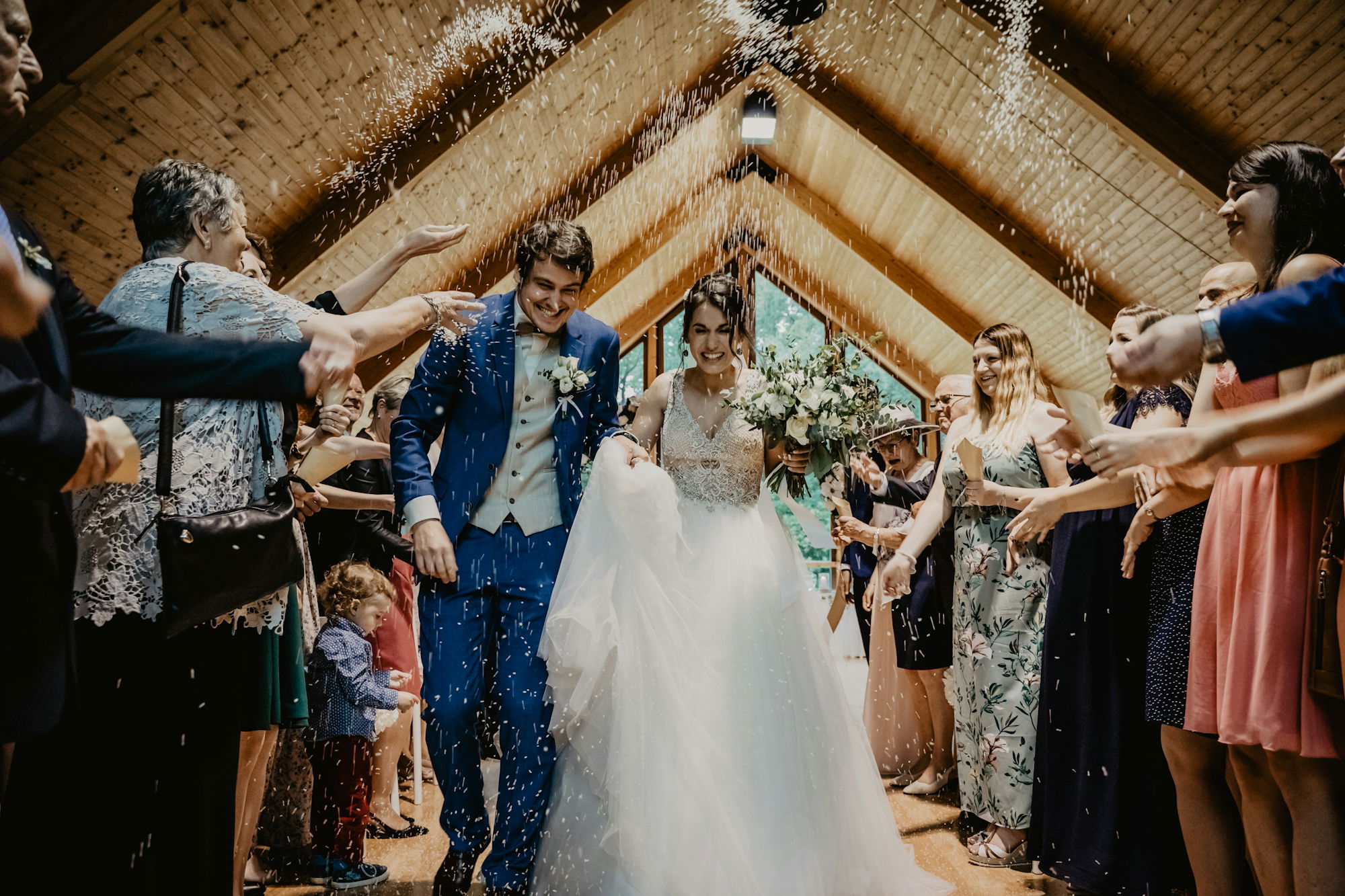 bride-and-groom-standing-beside-brown-wooden-wall.jpg bride and groom standing beside brown wooden wall