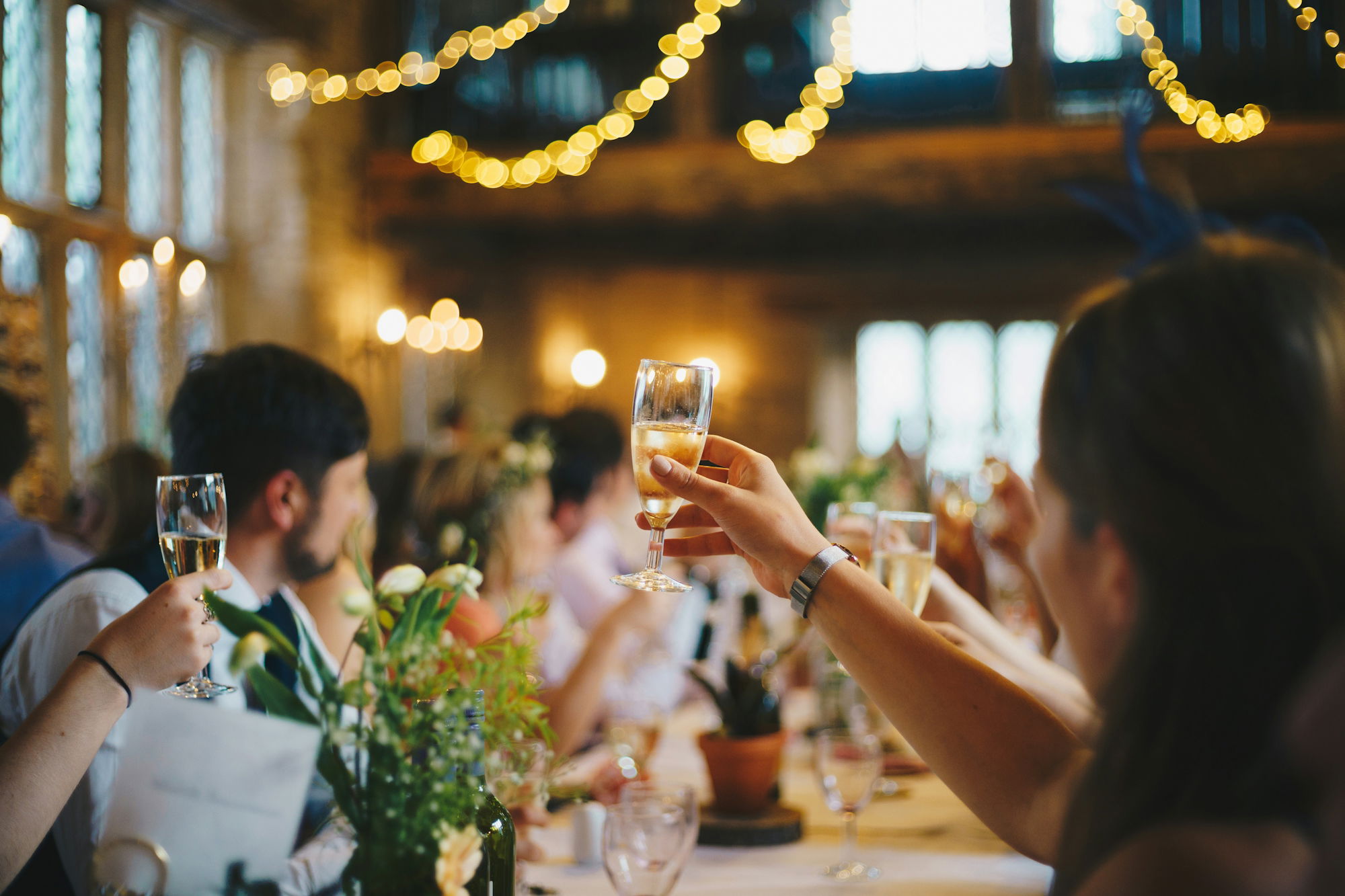 people-raising-wine-glass-in-selective-focus-photography.jpg people raising wine glass in selective focus photography