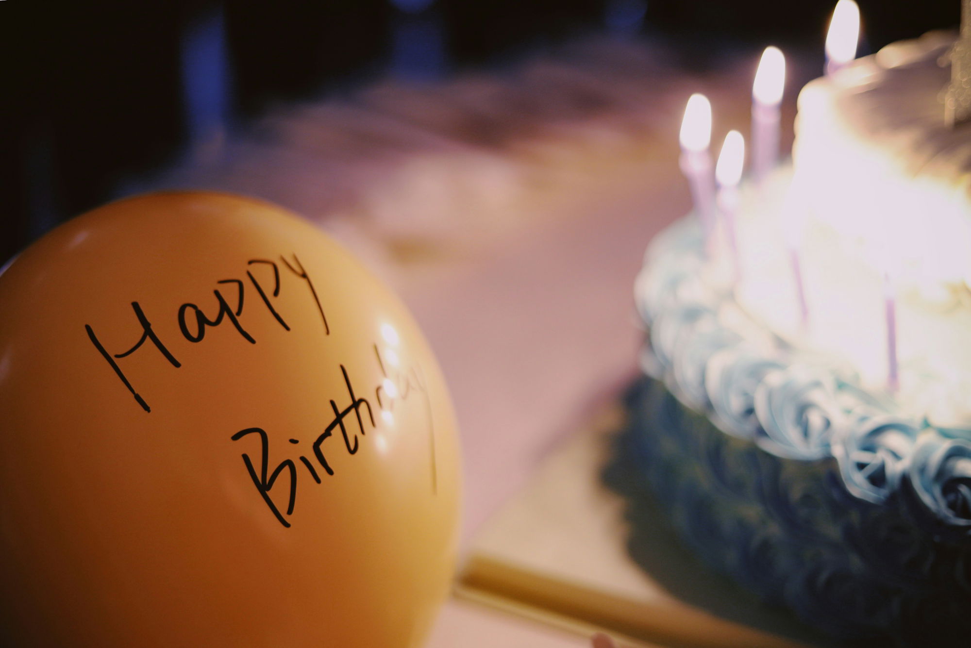 yellow-balloon-near-cake.jpg yellow balloon near cake